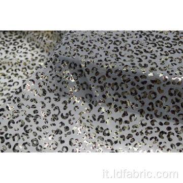 Tessuto a rete con motivo leopardato 100% poliestere